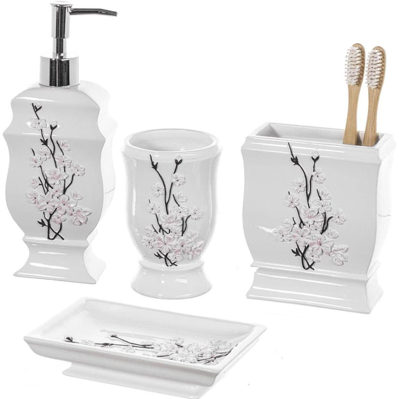 L'ensemble d'accessoires de salle de bain 4 pièces Vanda comprend: distributeur de savon, porte-brosse à dents, gobelet et porte-savon