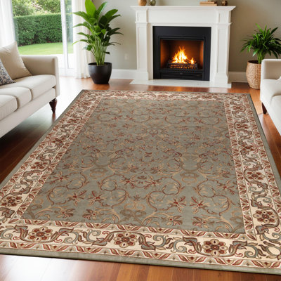 Tapis d'intérieur vert à motif floral et à volute de style oriental traditionnel