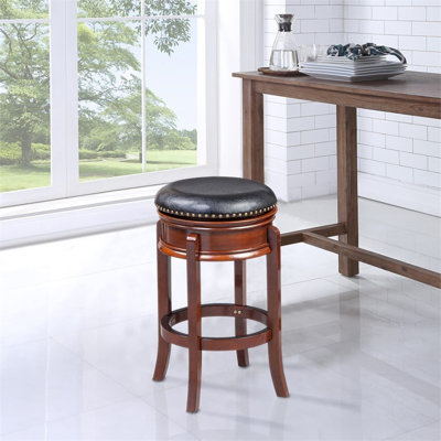 Pemberly Row Rubberwood Counter Height Swivel Stool Brass Nailhead in Cherry