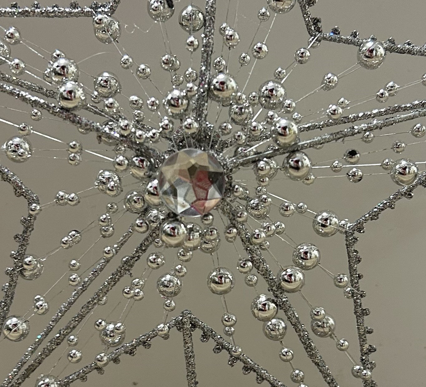 The Holiday Aisle® 12" Tree Topper, Silver