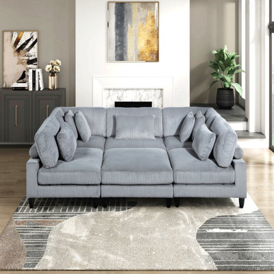 Fauteuil sans accoudoirs en velours côtelé gris