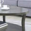 Table basse ovale avec plateau en bois manufacturé et tablette-1599568503