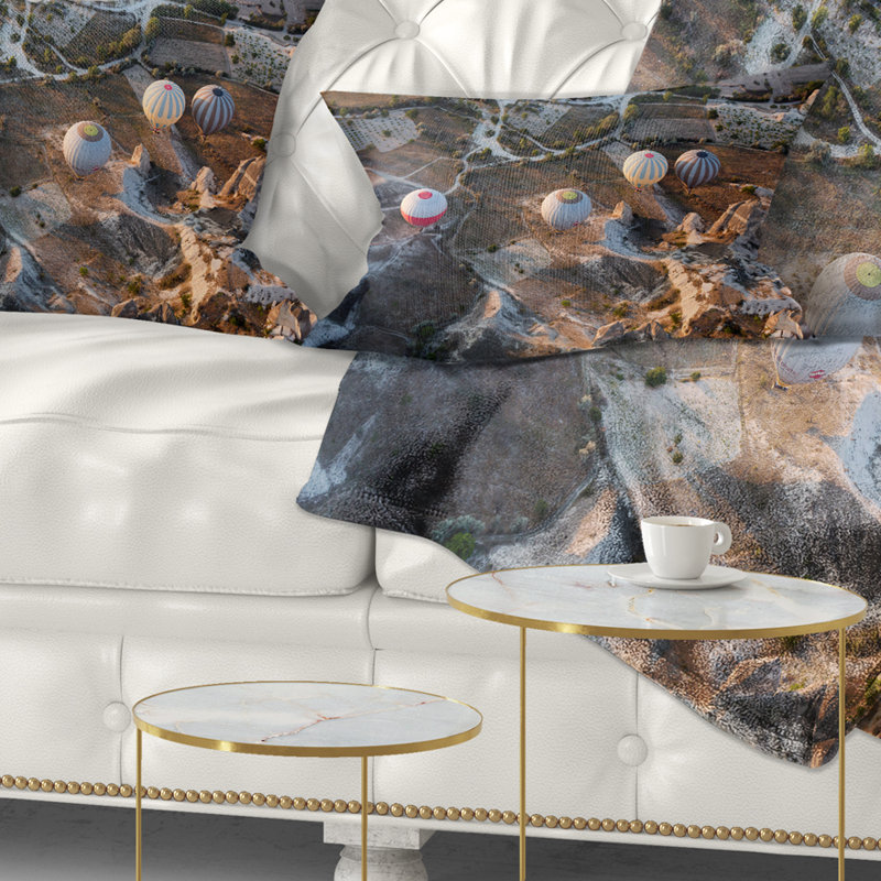 Coussin lombaire imprimé vol avec ballons au lever du soleil