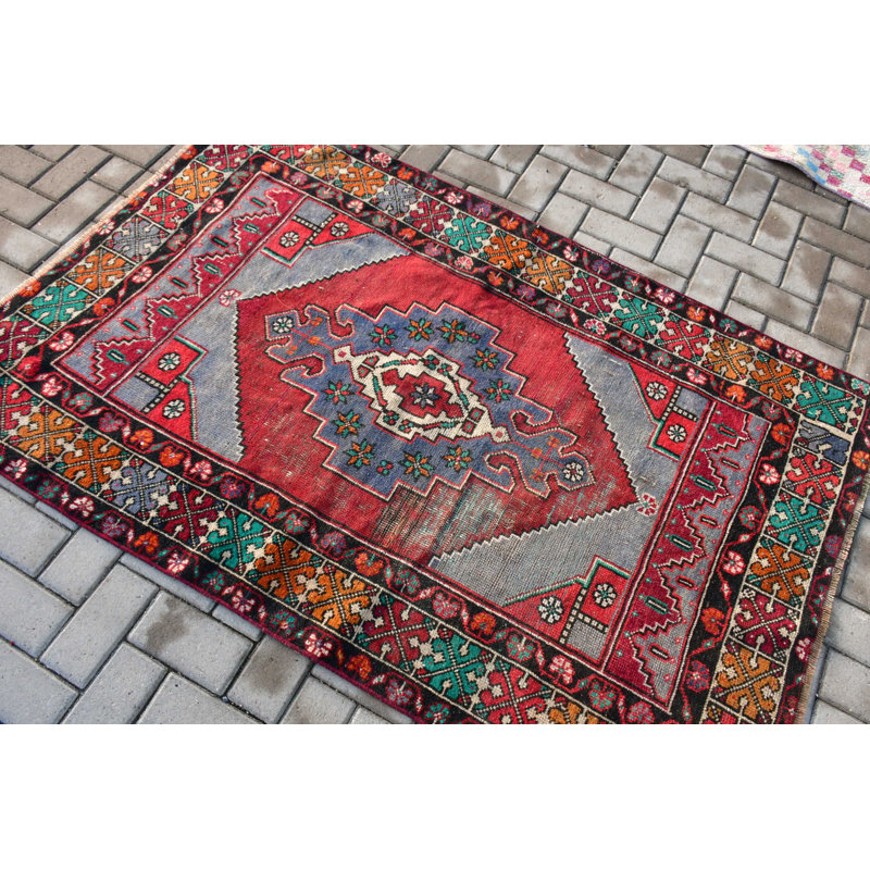 Tapis traditionnel traditionnel turc tissé à la main en rouge vif et bleu avec motif géométrique pour une touche d'élégance de décoration intérieure