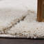 Tapis crème à motif abstrait Allaire-32701699