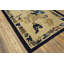 Petit tapis rectangulaire en laine noué à la main de couleur ivoire antique