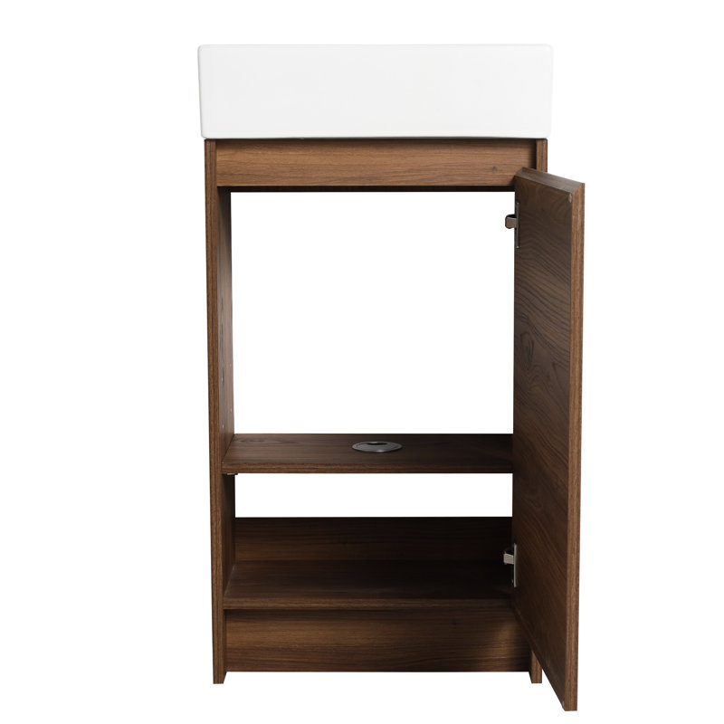 Meuble-lavabo autoportant de 18 pouces avec lavabo simple. Armoire à portes à fermeture douce. Lavabo en céramique longue durée. Caractéristique d'armoire en contreplaqué brun pour salles de bain compactes. Salle de bain