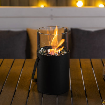 Wax burning Tabletop Fireplace with Lockable Handle and Glass Wind Guard