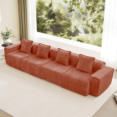 Canapé modulable rouge 4 places sans ossature, revêtement en velours, passepoil français, aucun assemblage requis, tissu haute résilience pour un confort durable, accoudoirs confortables pour une détente optimale.