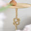 Table d'appoint dorée 13,8 po x 13,8 po x 24 po - base en marbre blanc