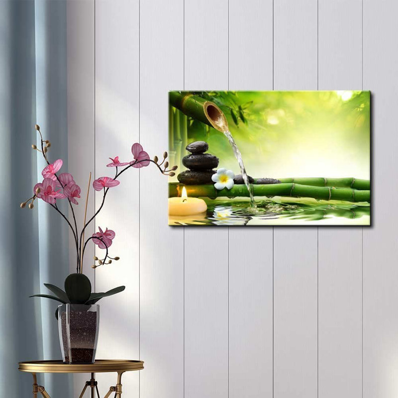 «Zen Stones Rocks and A Flower Over Bamboo on a Lake with a Waterfall», reproduction de photo sur toile tendue