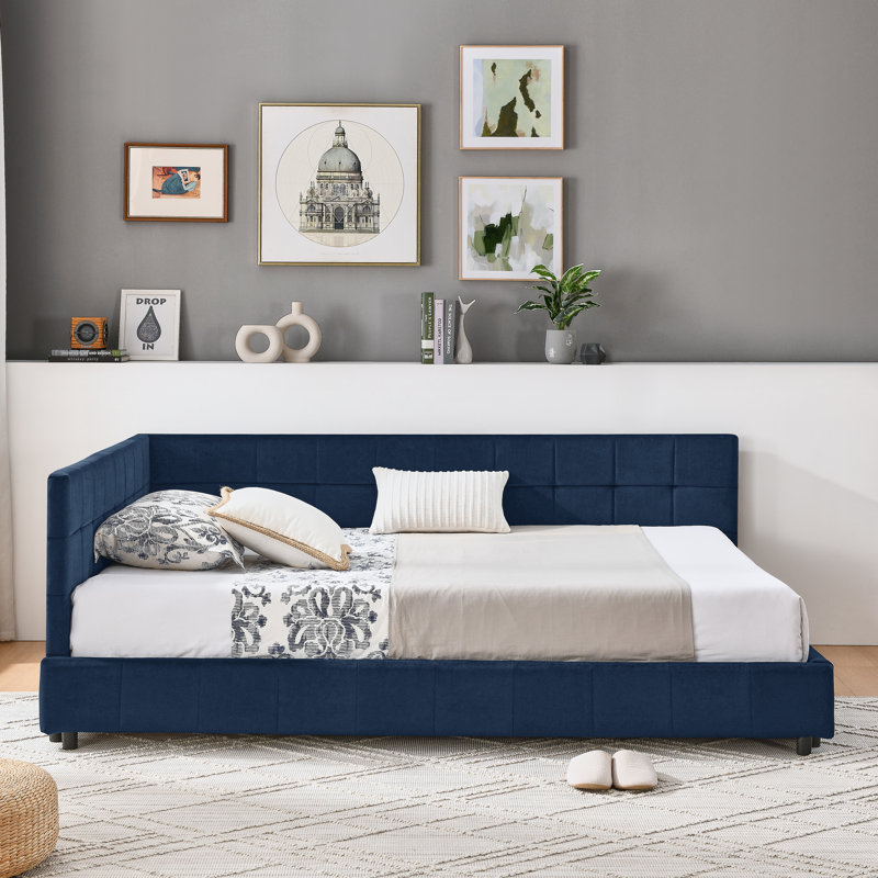 Canapé-lit double capitonné avec dossier et accoudoirs