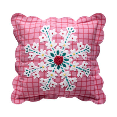 Coussin à carreaux roses et flocons de neige