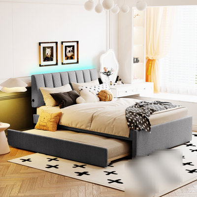 Lit plateforme tapissier fonctionnel avec molleton gris et lit gigogne simple brillant