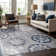 Chartier Machine Woven Floral Area Rug