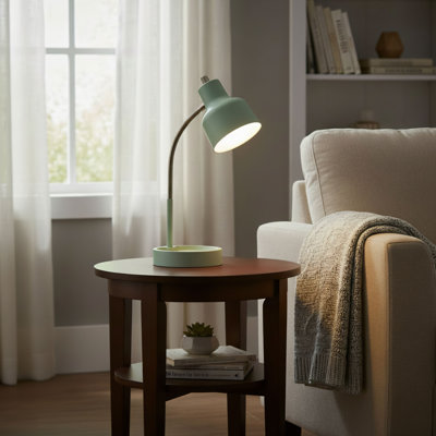 Matte Mint Green LED Desk Lamp With A Versatile Base For Stable Use In Various Settings. Integrated AC Power Outlet For Convenient Power Access. A Stylish And Practical Lighting Solution For Home, Office, And Study Use.