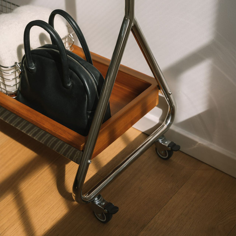 Modern Mobile Garment Rack with Adjustable Panels and 360° Wheels, Amber