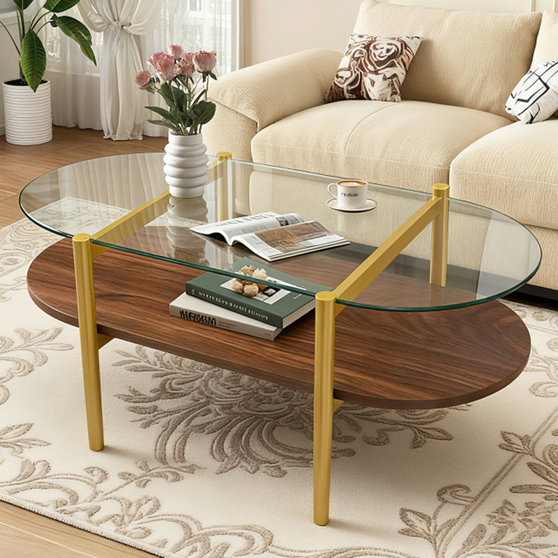 Table basse ovale en verre pour salon, 104 cm de longueur, double tablette, transparente et brune, pieds fuselés, structure de pièce.