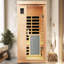 Chauffage infrarouge lointain pour une personne, intérieur, basse température, en bois de pruche, 8 panneaux chauffants, audio, commandes tactiles, protection contre la surchauffe et affichage en degrés Celsius.