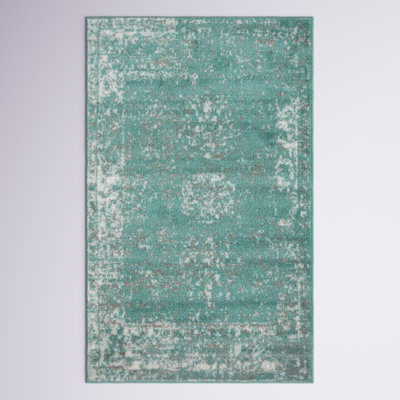 Tapis floral turquoise Brandt