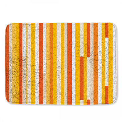 Tapis de bain jaune à rayures