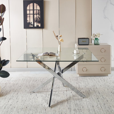 Table de salle à manger en métal chromé et verre peu encombrante pour la cuisine et le salon
