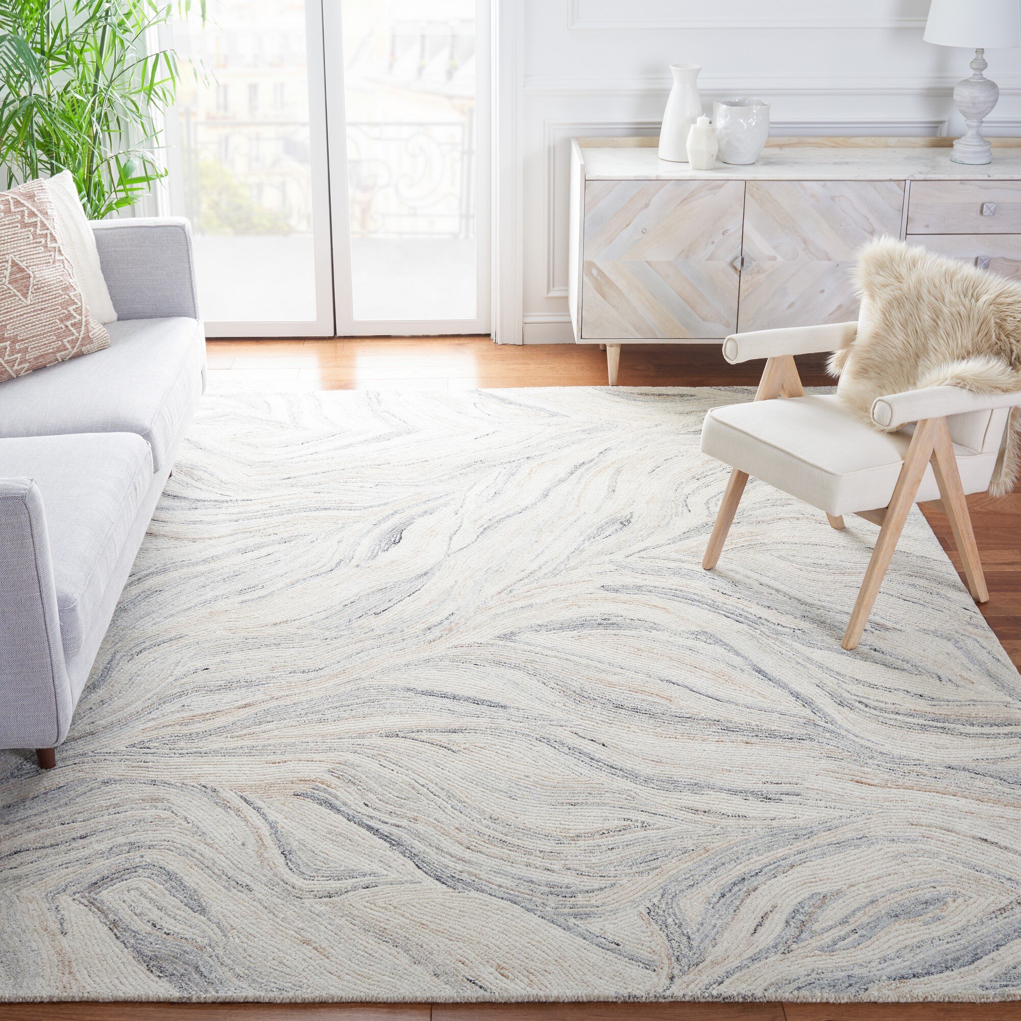 Aldwell Abstract Handmade Tufted Wool Cream Area Rug