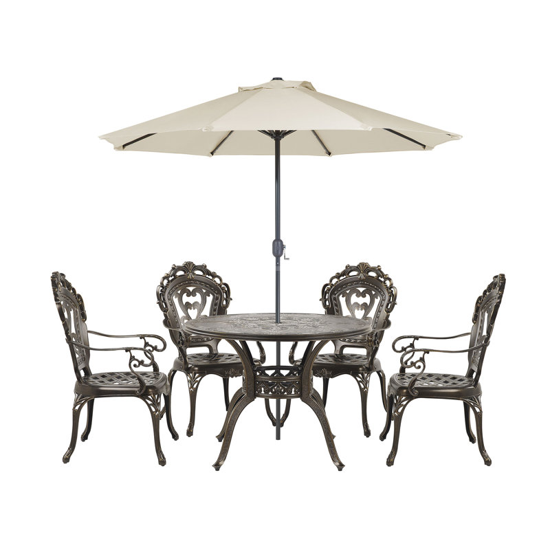 Fritch 4 - Person Patio Dining Set with Round Table , Cushions Included