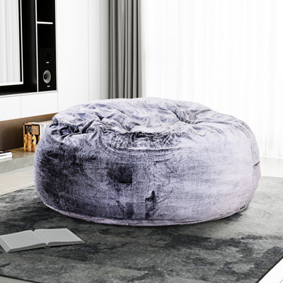 Fauteuil à billes mauve, moelleux, sans accoudoirs, confortable et rond en fausse fourrure