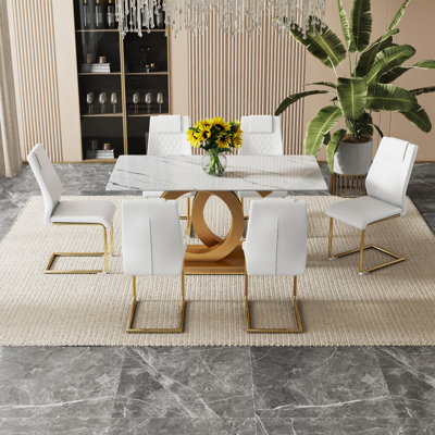 Table And Chair Set.Subtle Luxury Tempered Glass Dining Set - 63"X35.4" With 6 White PU Chairs With Golden C-Tube Metal Leg.Arched Metal Gold Leg.White Imitation Marble Texture Sticker Tabletop.