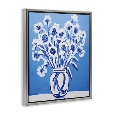 Cadre flottant bleu et blanc à fleurs contrastantes, design par lettré et doublé