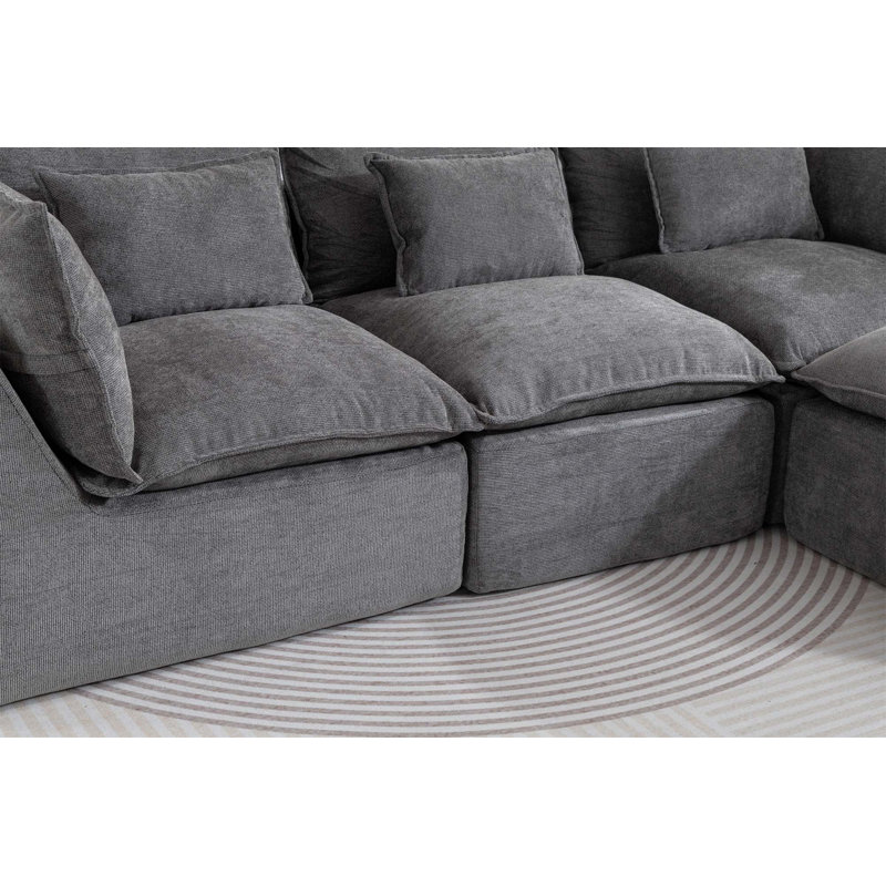 Canapé modulaire surdimensionné surdimensionné avec repose-pieds, sièges profonds et larges pour un confort ultime et des aménagements de salon flexibles.