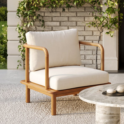 Fauteuil club d'extérieur en bois d'acacia avec coussin Emmry