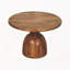 Table basse sur piédestal en bois sculpté