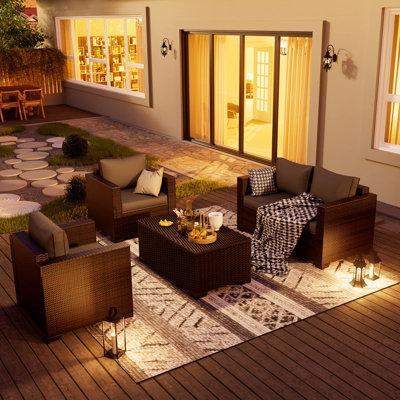 Azoriah Wicker 4 - Person Outdoor Seating Group with Storage by Latitude Run