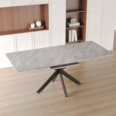 Table de salle à manger extensible grise avec pieds noirs en forme de X (62,4 po à 78,15 po)