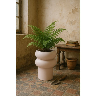 Pot de fleurs en tôle