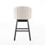 Élégant tabouret de bar pivotant avec garniture cloutée et coussin confortable pour la cuisine et le salon.