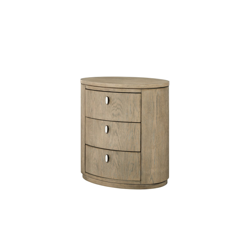 Table de chevet ovale de couleur caramel avec trois tiroirs à fermeture en douceur, ports intégrés pour le chargement de l'appareil, silhouette cylindrique élégante, finition grain de bois chaud, poignées de tiroir réfléchissantes, plateau en feutre et
