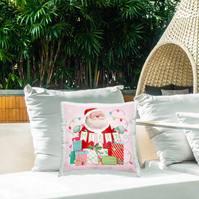 Coussin d'extérieur imprimé «Merry Pinkmas Santa» par Nicole Tamarin