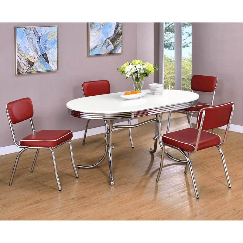 Élégant mobilier de salle à manger blanc et ovale - dégage un look sophistiqué pour la maison
