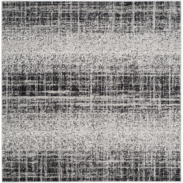 Riebe Abstract Silver/Black Area Rug