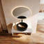 Meuble-lavabo flottant peu encombrant avec lavabo vasque noir mat et rangement ouvert