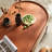 Oval saddle leather coffee table