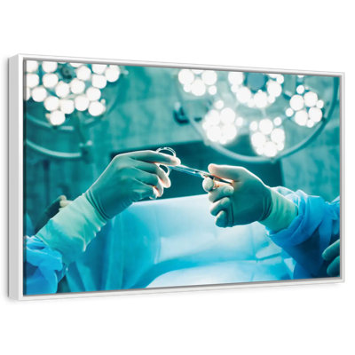 Nurse Handing Surgical Scissors