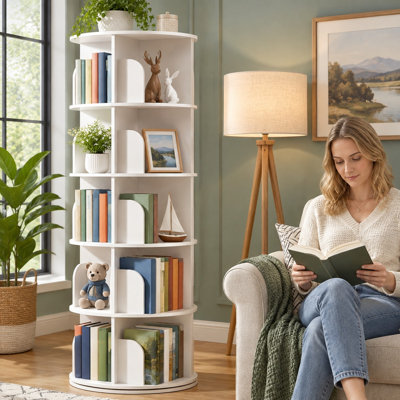 This white, 5-tier round bookshelf works as a 360° rotating storage carousel, providing a vertical spiral-style turning organizer for books and other items in corners.
