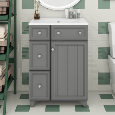 Armoire de salle de bain 24 po avec lavabo, 2 tiroirs, 1 porte à fermeture douce, meuble de rangement autoportant avec lavabo en céramique