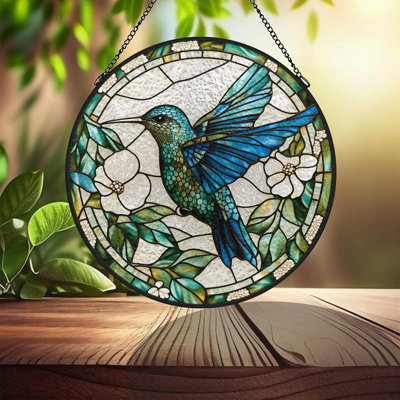Colibri en vitrail avec fleurs