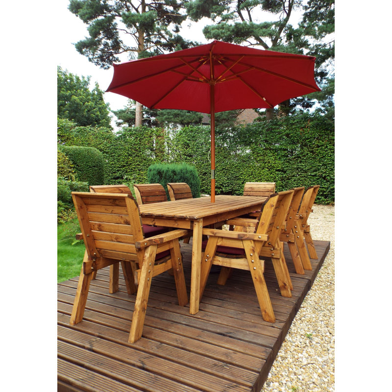 Finney 8 - Person Wood Patio Dining Set with Rectangular Table , Cushions Included, Burgundy