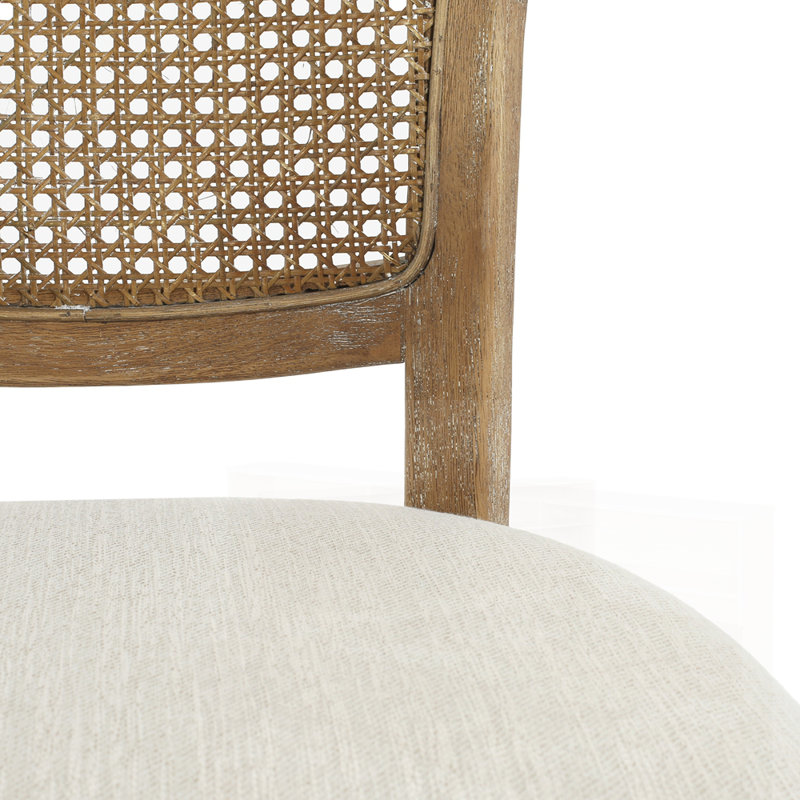 Élégante chaise de salle à manger avec revêtement confortable et structure robuste, parfaite pour les cuisines modernes et traditionnelles.